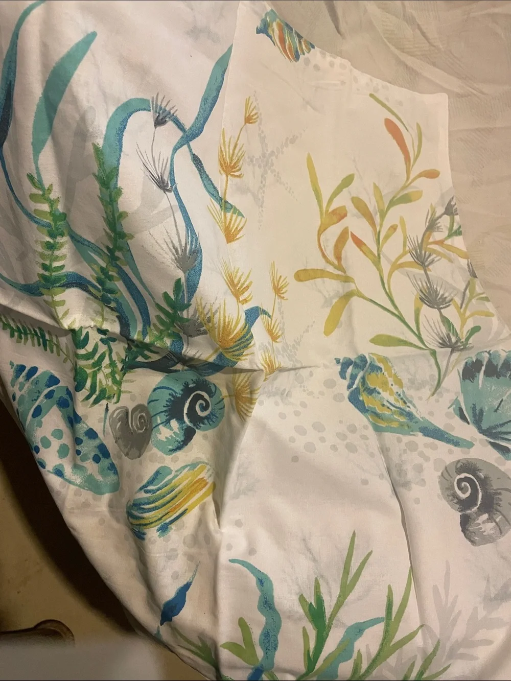 Handcrafted Cotton Napkin with Teal Seaweed Motif and shells . Set of 4